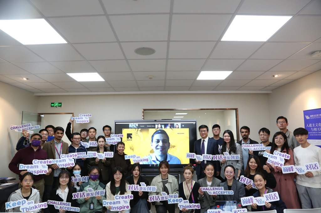 A group of people posing for a photoDescription automatically generated with medium confidence A group of people posing for a photoDescription automatically generated with medium confidence